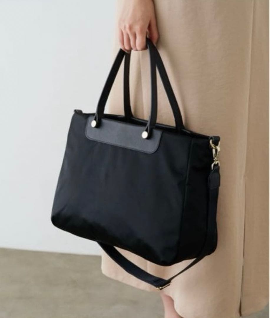 超美品ラシット今期A4入るポケット多数三層構造メタルロゴ2wayバッグ