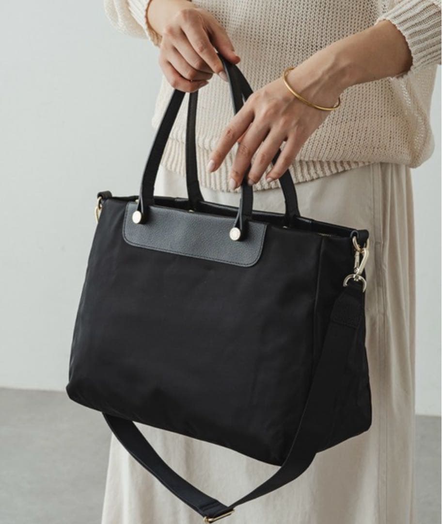 超美品ラシット今期A4入るポケット多数三層構造メタルロゴ2wayバッグ