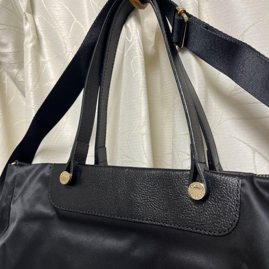 超美品ラシット今期A4入るポケット多数三層構造メタルロゴ2wayバッグ