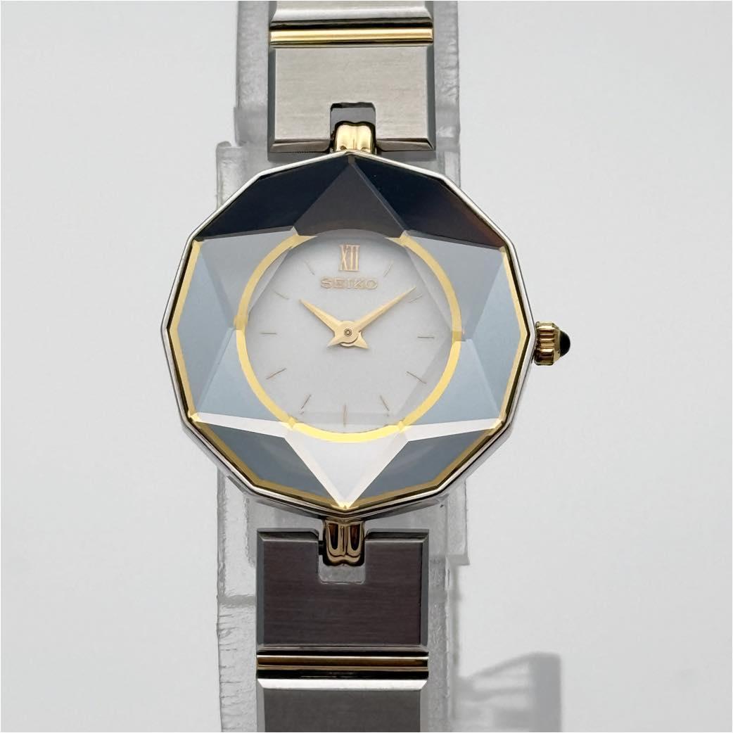 SEIKO 1E20-0D70 QZ 白 SS 不動 サファイヤ ヘキサゴン