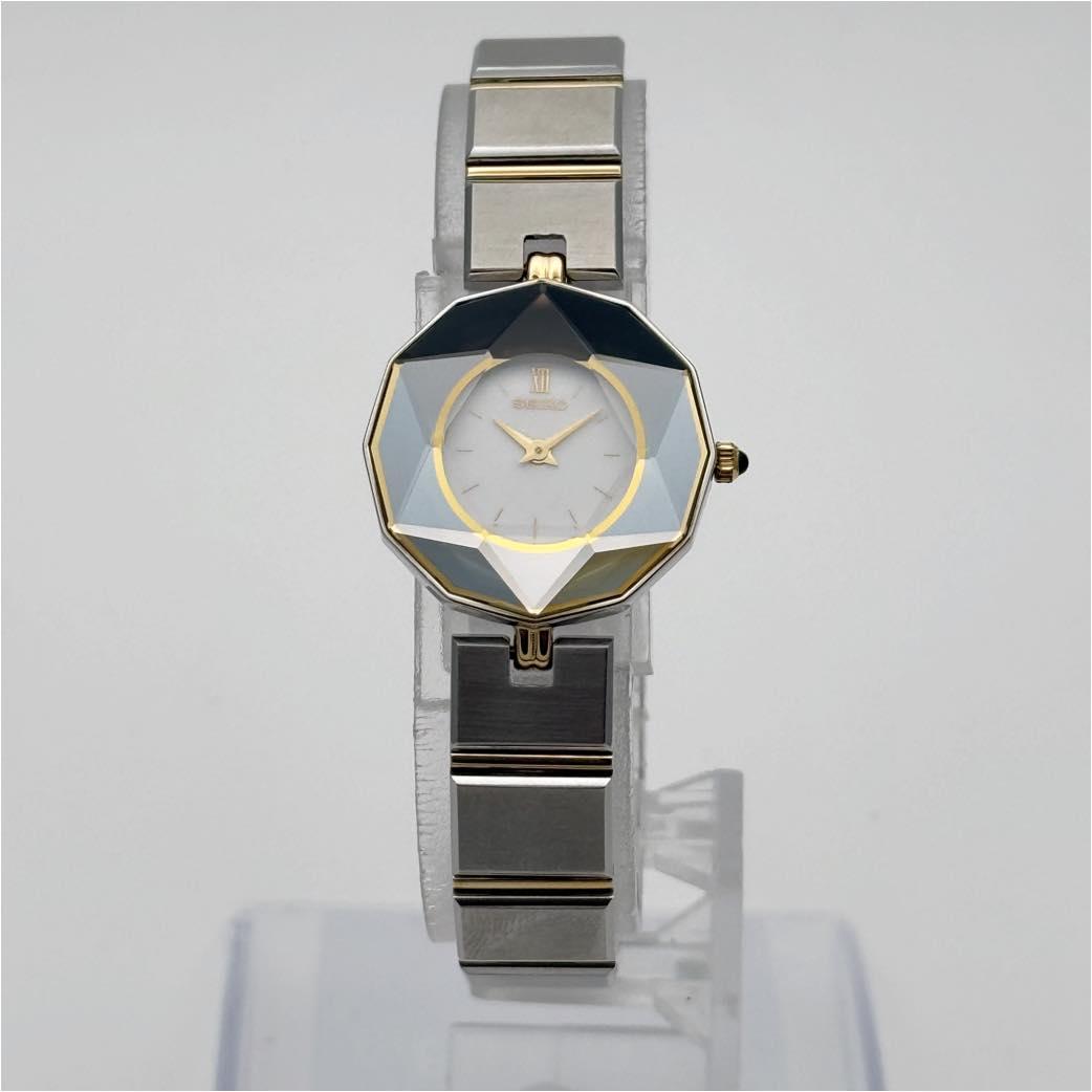 SEIKO 1E20-0D70 QZ 白 SS 不動 サファイヤ ヘキサゴン