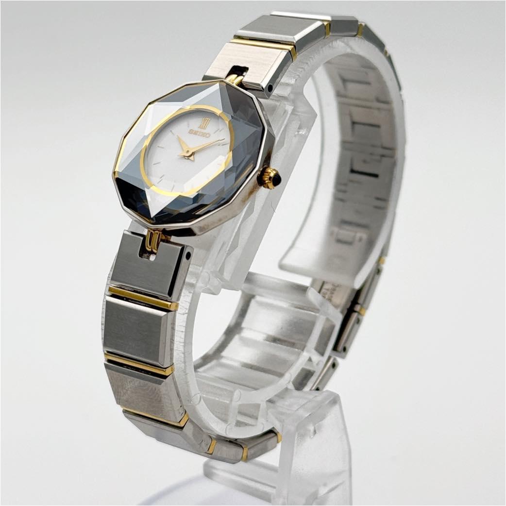 SEIKO 1E20-0D70 QZ 白 SS 不動 サファイヤ ヘキサゴン