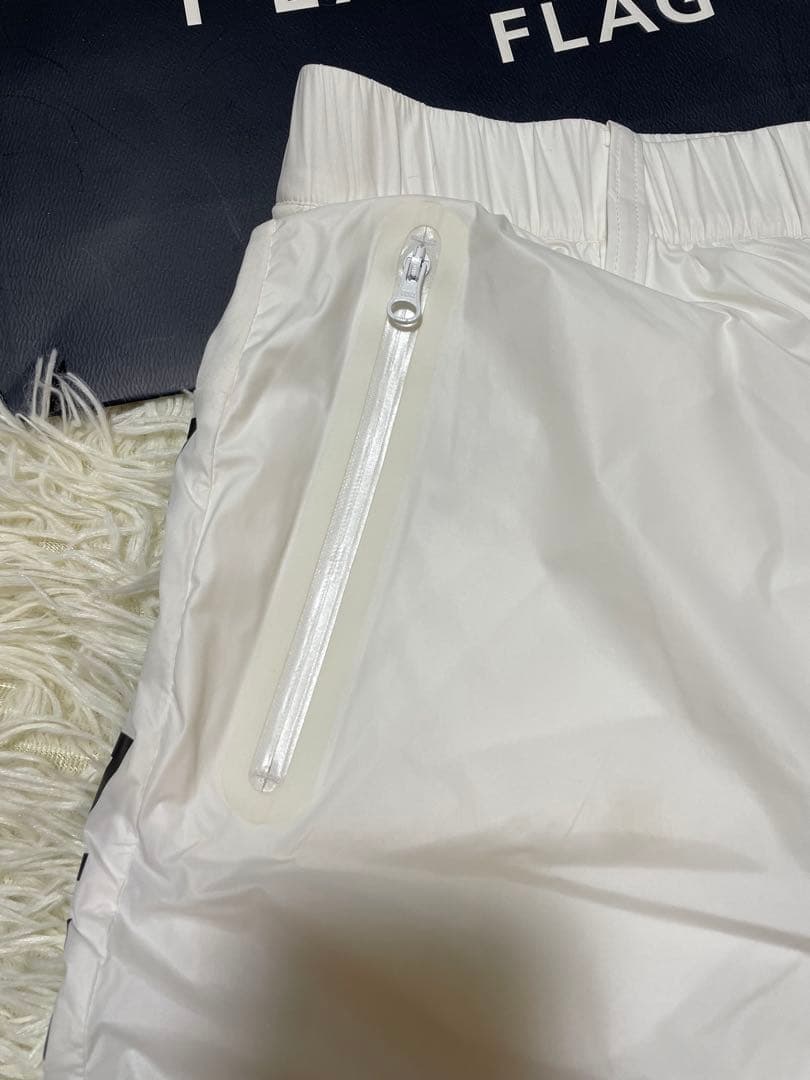 パーリーゲイツ 【軽量保温】バックロゴプリーツ切替タフタスカートサイズ2