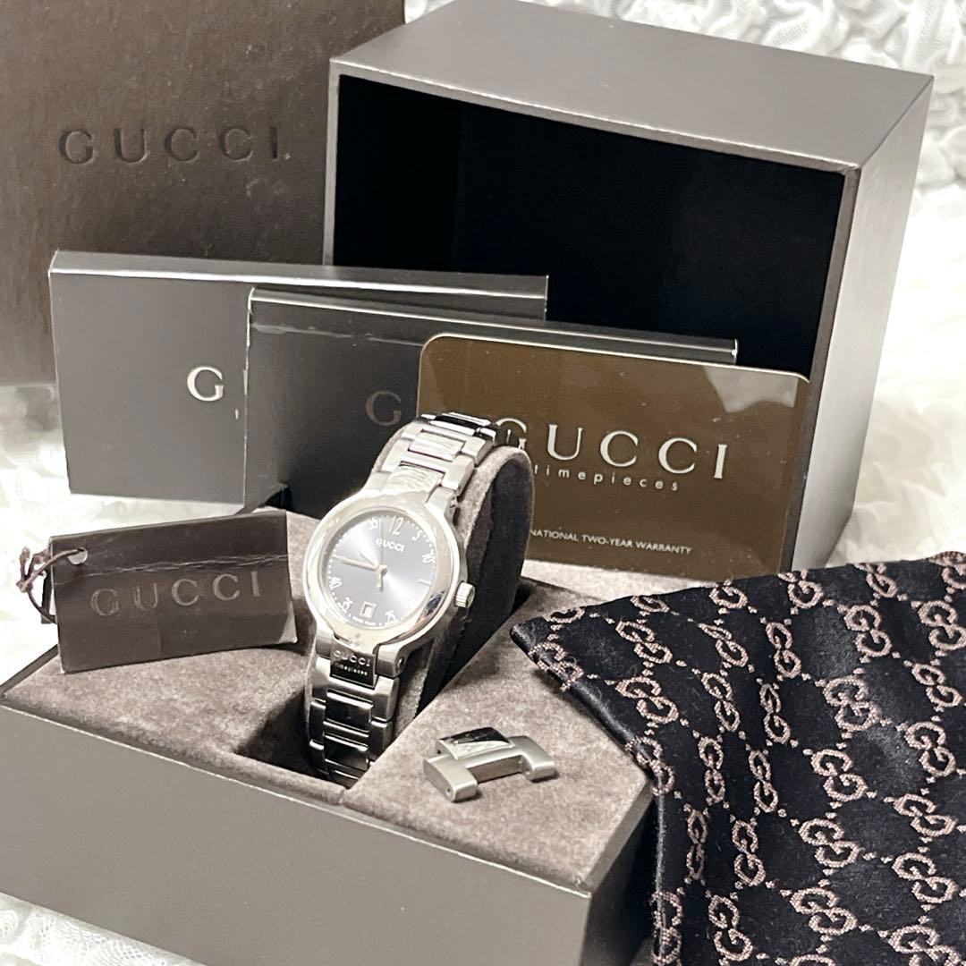箱付✨稼働　GUCCI シルバー 腕時計　8900l グッチ　コマ付　GG 巾着