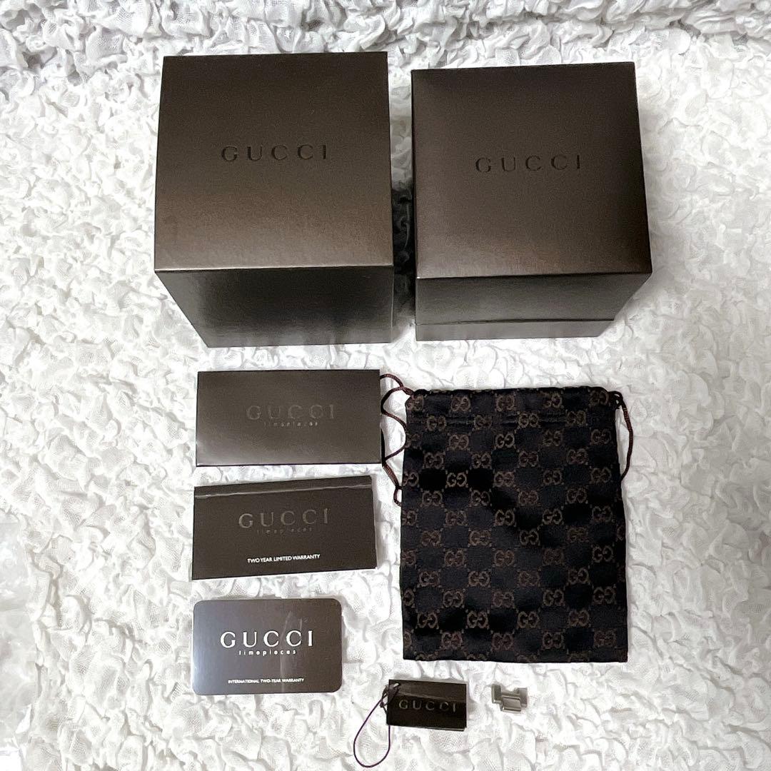 箱付✨稼働　GUCCI シルバー 腕時計　8900l グッチ　コマ付　GG 巾着