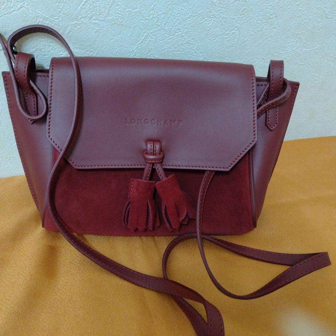 【ロンシャン 】ペネロペ　ショルダーバッグ タッセル付きえんじ色