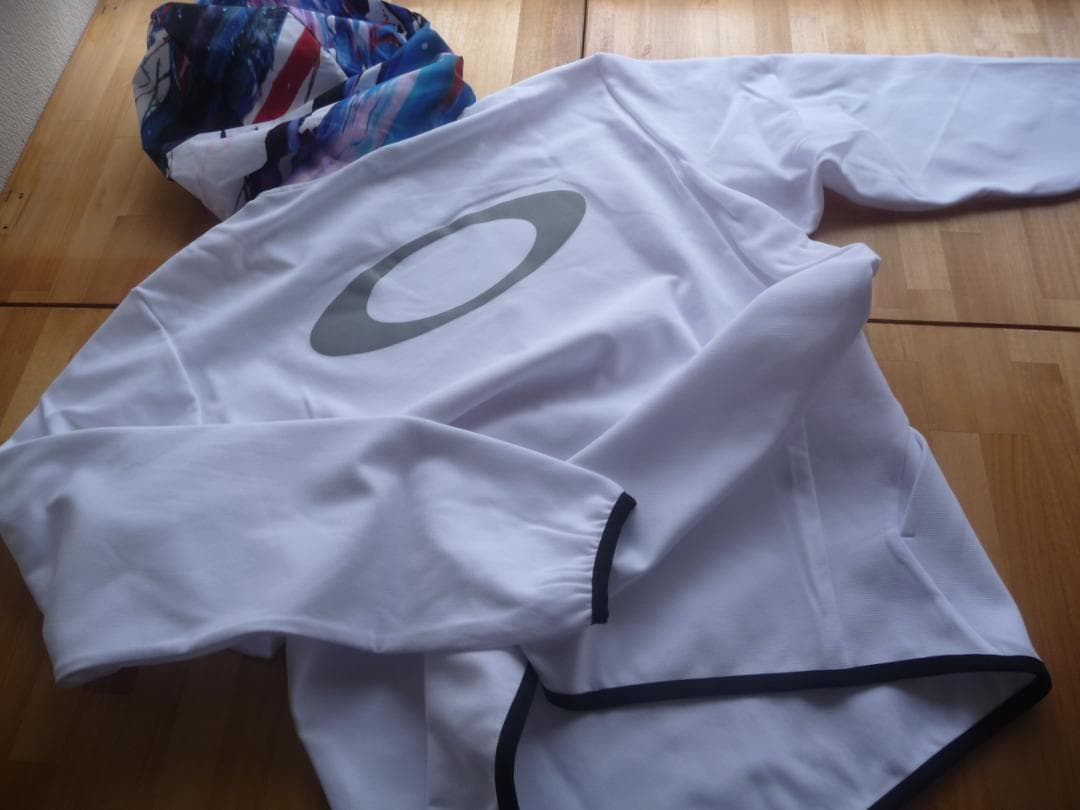 オークリー ENHANCE MY MOBILITY HOODY白L 新品未使用品