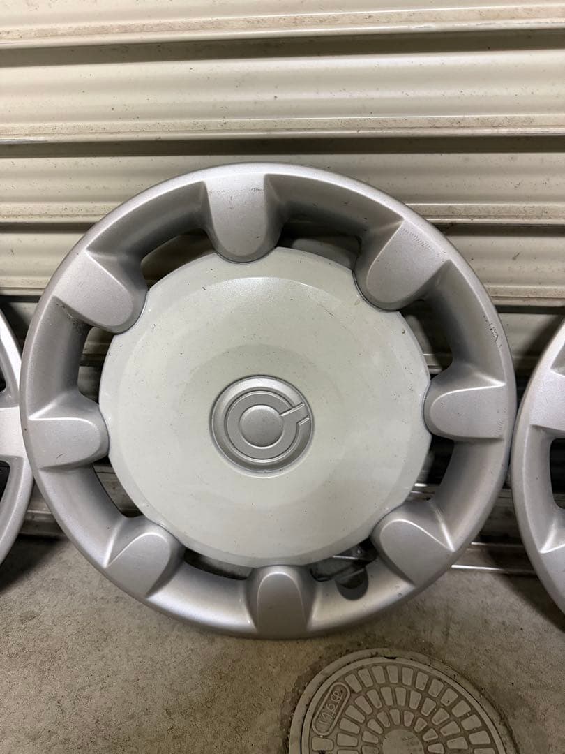 ムーブキャンバス純正ホイールキャップ新車外し中古品傷汚れ有り。４枚セット