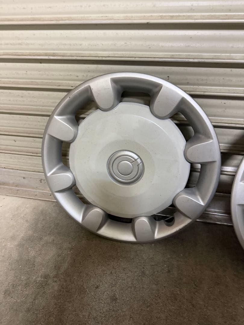 ムーブキャンバス純正ホイールキャップ新車外し中古品傷汚れ有り。４枚セット