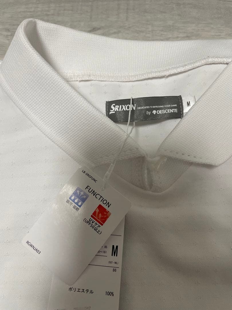 新品　Mサイズ ゴルフウェア　レディース　白　ポロシャツ　スリクソン　シャツ