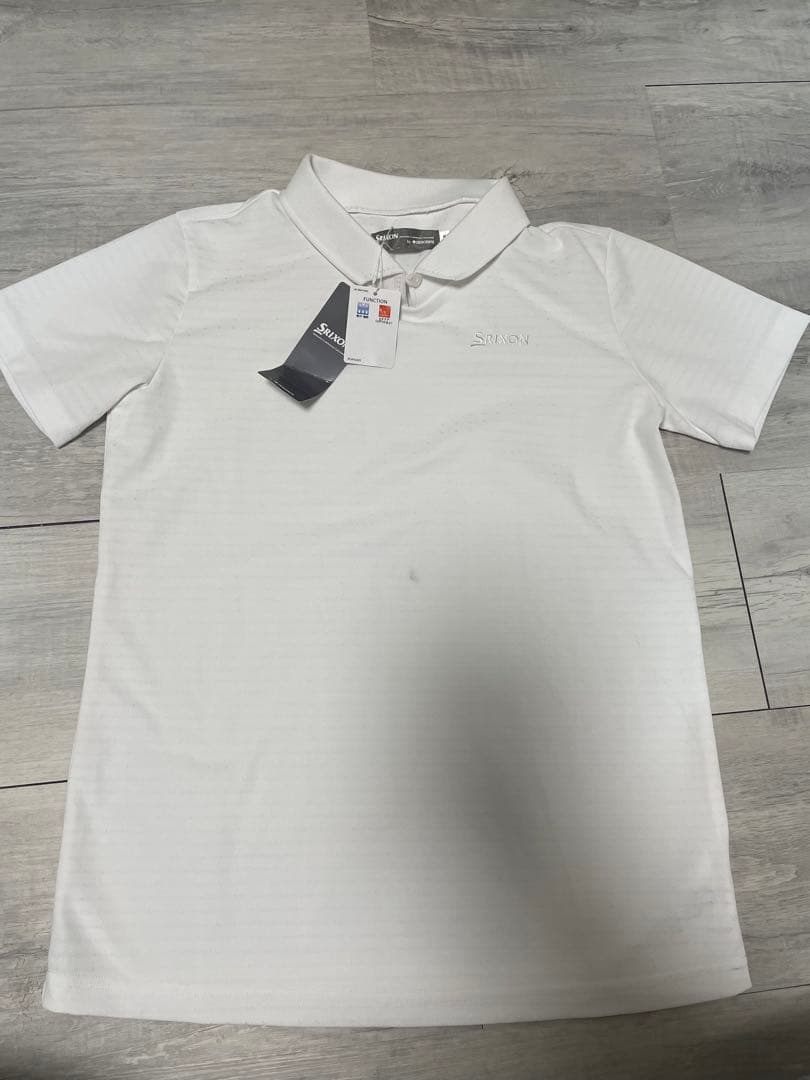 新品　Mサイズ ゴルフウェア　レディース　白　ポロシャツ　スリクソン　シャツ