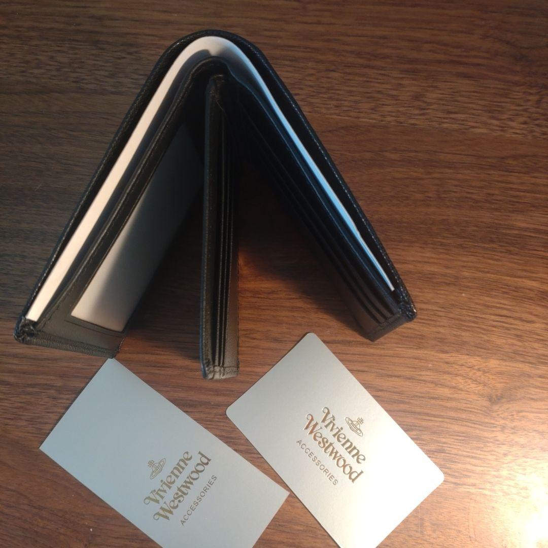 [新品、未使用]Vivienne Westwood ブラック二つ折り財布