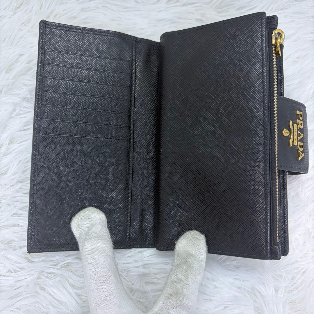 美品✨プラダ 長財布 折り財布 サフィアーノ レザー ロゴ金具 ブラック