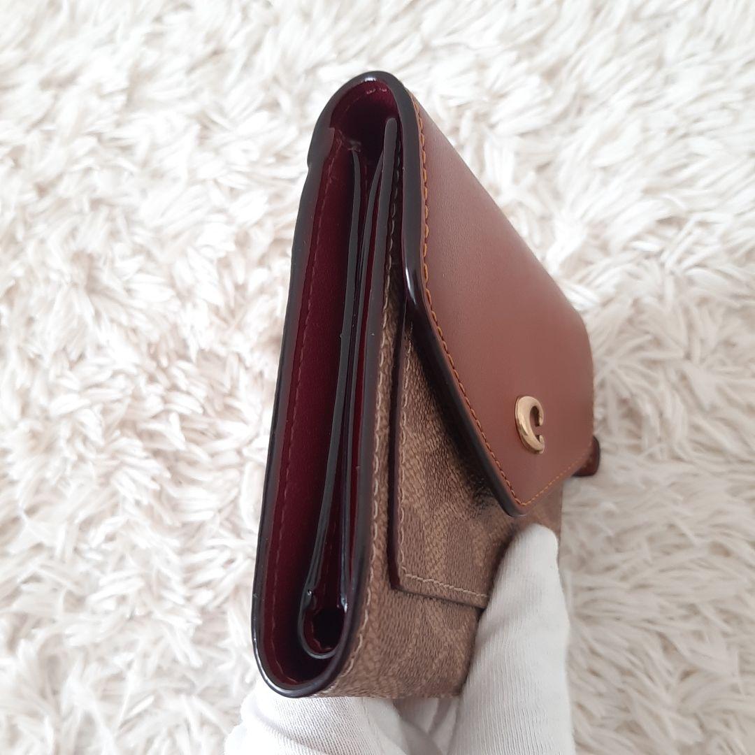 未使用品　COACH　コーチ　三つ折り財布　シグネチャー　ブラウン　C2329