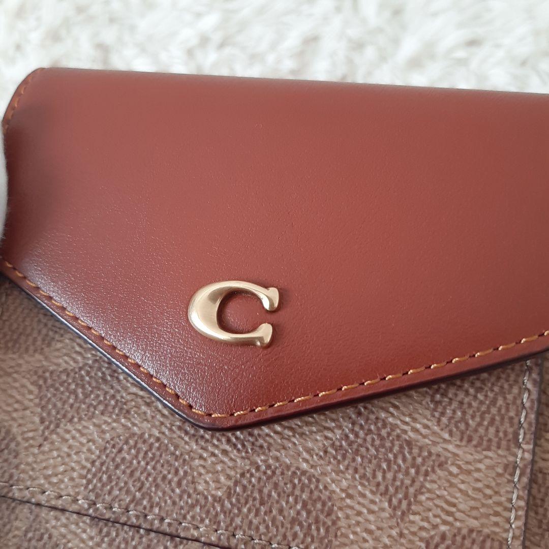 未使用品　COACH　コーチ　三つ折り財布　シグネチャー　ブラウン　C2329