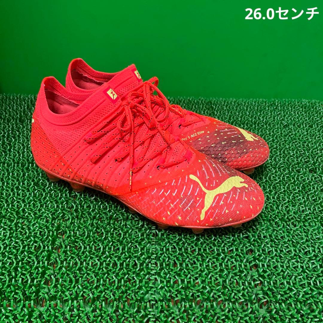 プーマ サッカースパイクフューチャーZ 1.4 HG/AG(オレンジ×イエロー)