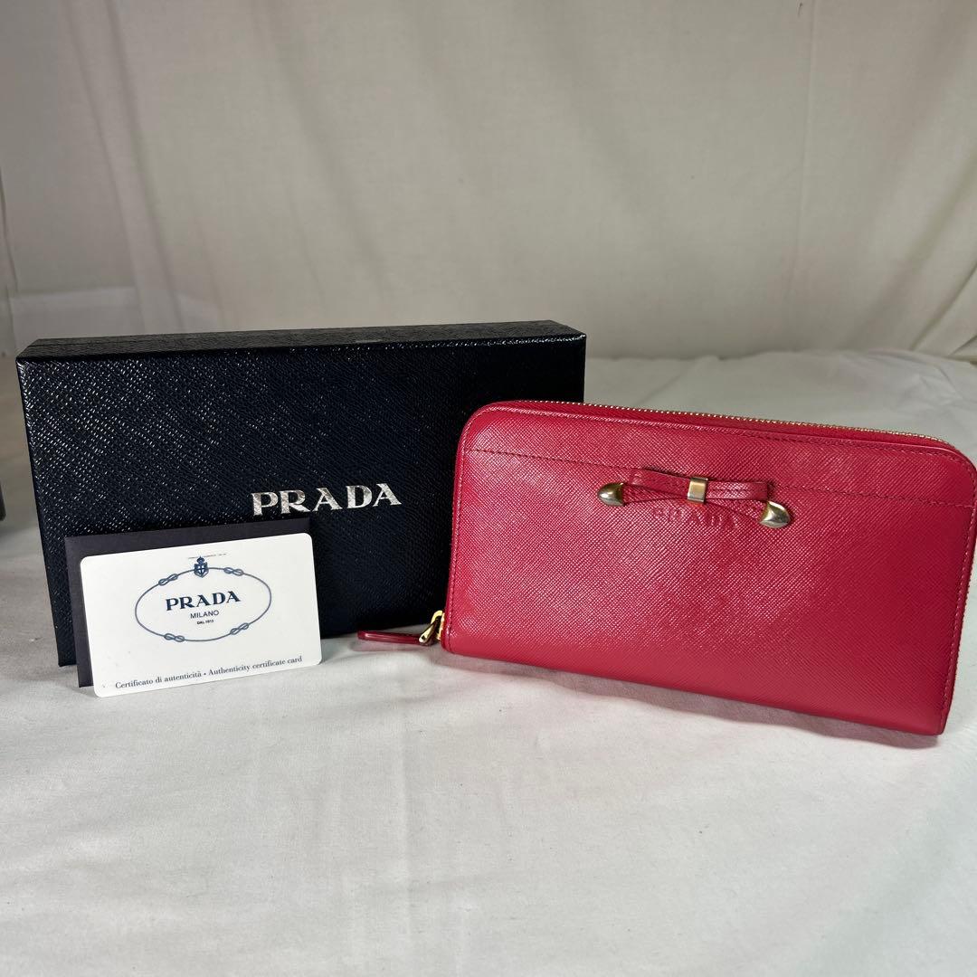 【sk/7.20/30】PRADA ピンク 二つ折り財布 リボン付き