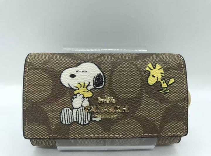 新品未使用コーチ5連キーケーススヌーピー柄ブラウンレディース送料無料即日発送