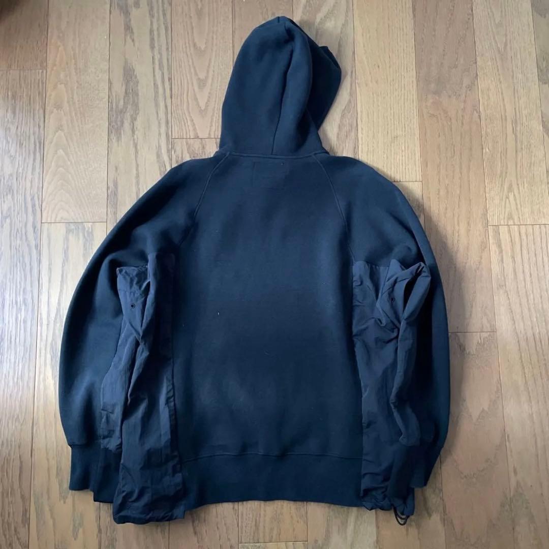 NIKE sacaiコラボフーディ