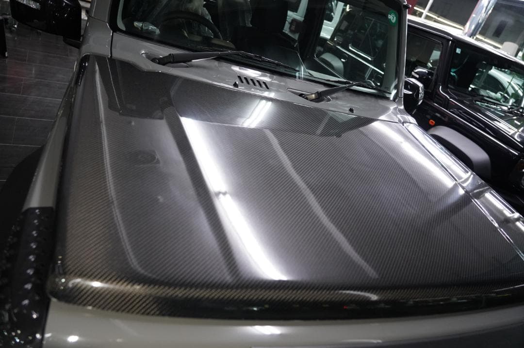 たにけんジムニーブラックカーボンボンネット　JB64　クリアー塗装品