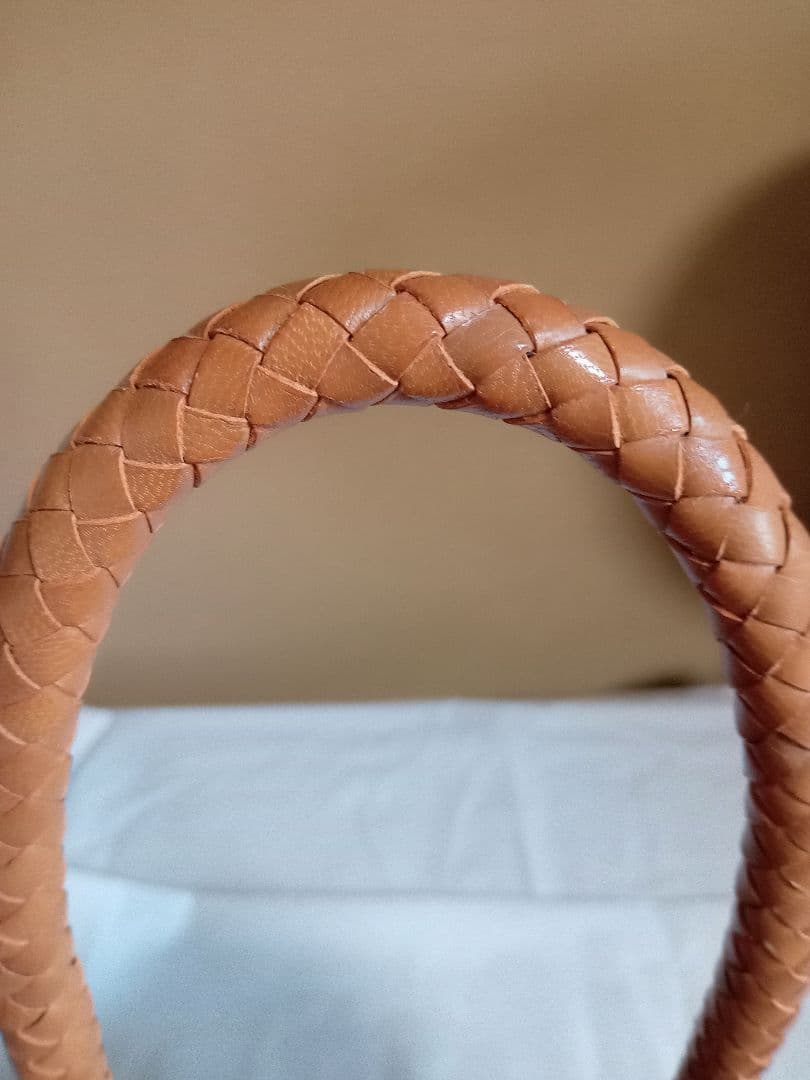 RENキャメル やぎ革メッシュバッグ タッセル付き