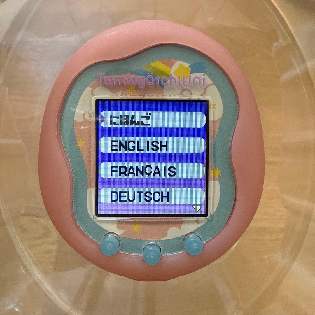 たまごっちユニ•ガイドブック付き