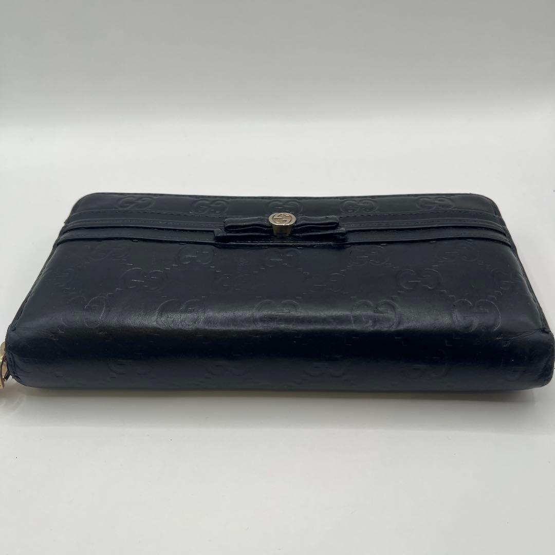 鑑定済　GUCCI グッチ ラウンドファスナー財布 GG リボン シマレザー
