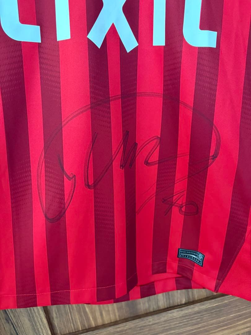 鹿島アントラーズ　鈴木優磨選手　サイン入りユニフォーム　Lサイズ