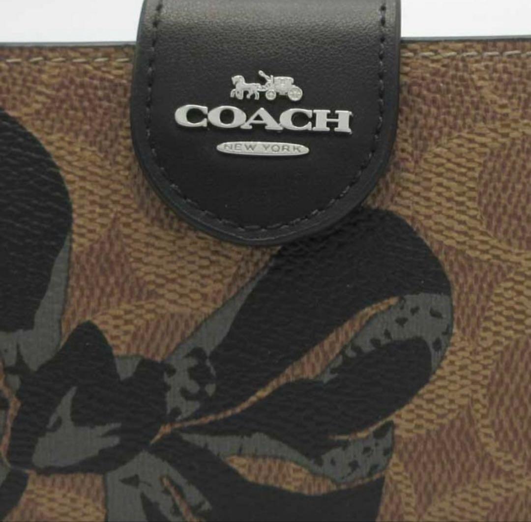 新品未使用 COACH 二つ折り財布 リボン柄 大人可愛い プレゼント