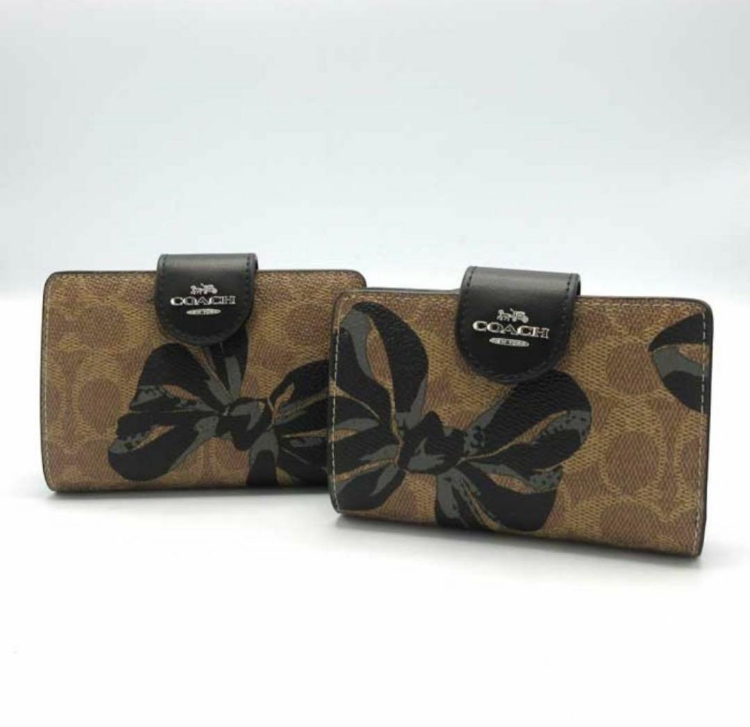 新品未使用 COACH 二つ折り財布 リボン柄 大人可愛い プレゼント