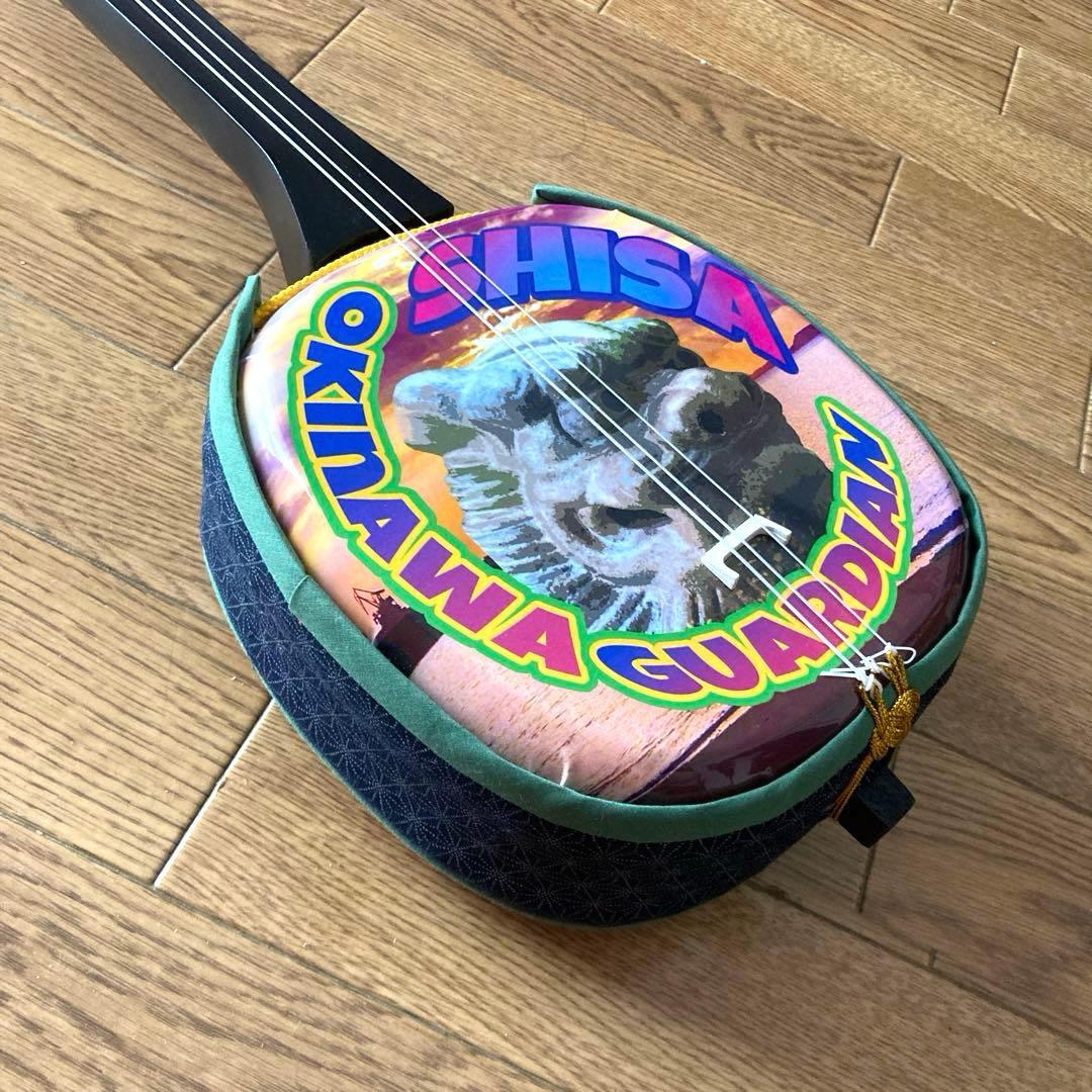 シーサーデザインの三線（戻らないカラクイ付き）