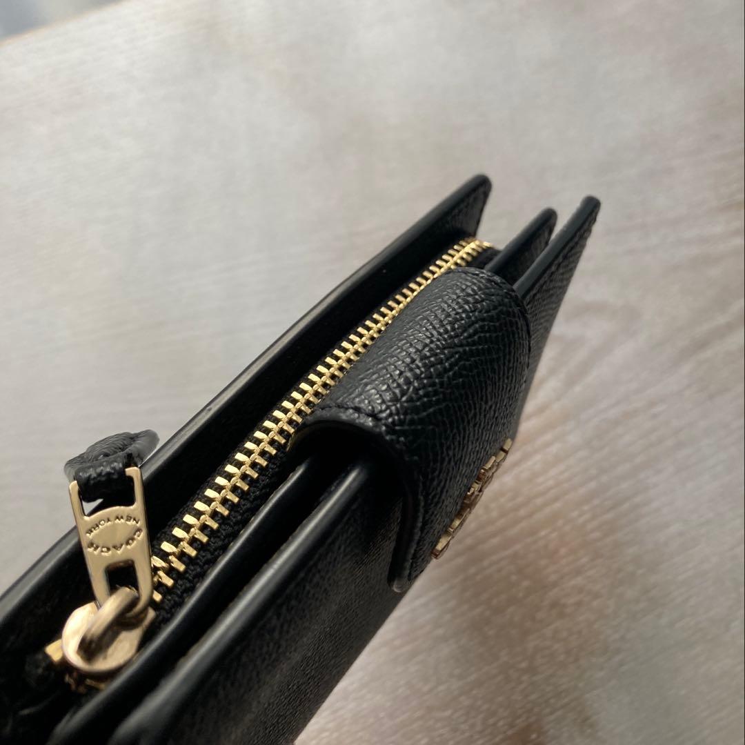 COACH コーチ　2つ折財布黒　ゴールド金具馬車ロゴ