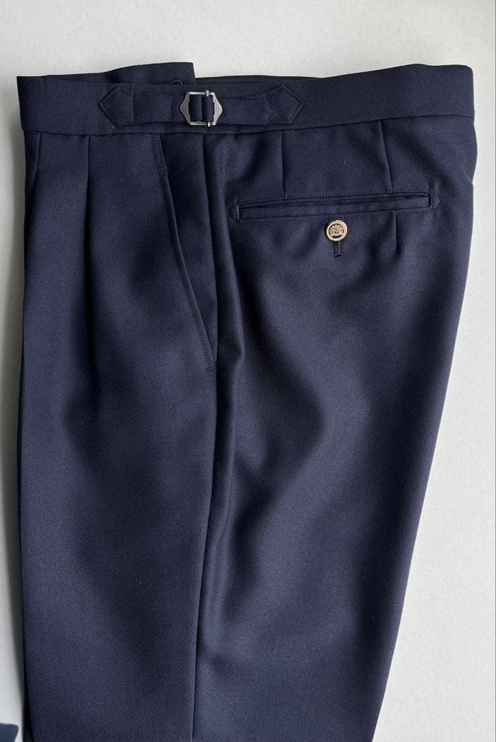 ネイビー 2タックインプリーツスラックス ダブル裾