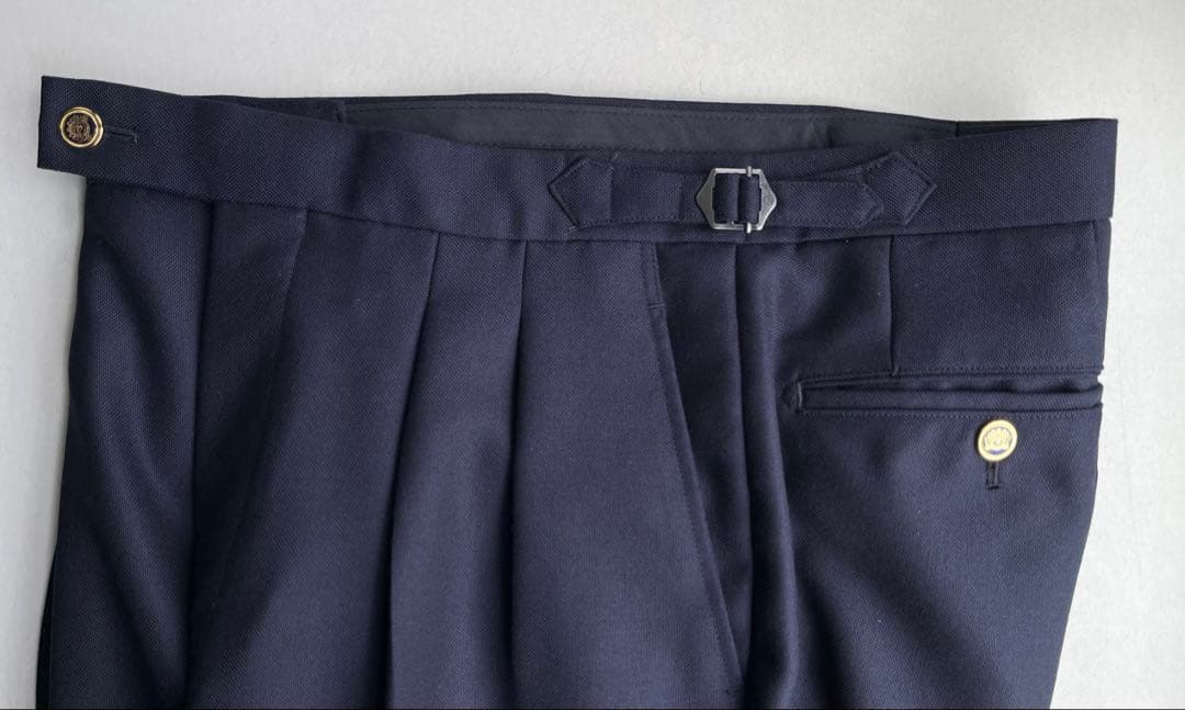 ネイビー 2タックインプリーツスラックス ダブル裾