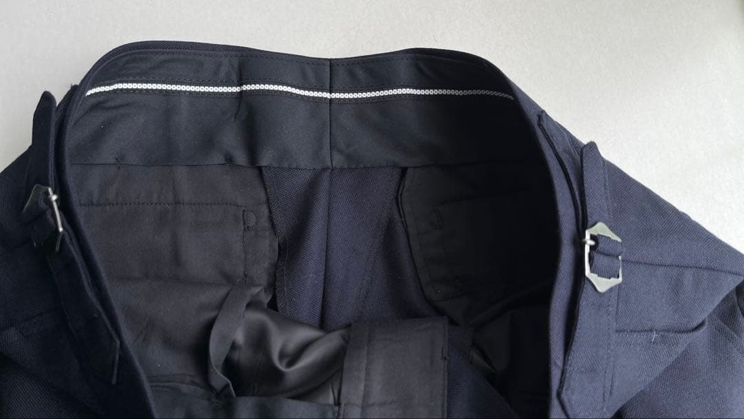 ネイビー 2タックインプリーツスラックス ダブル裾