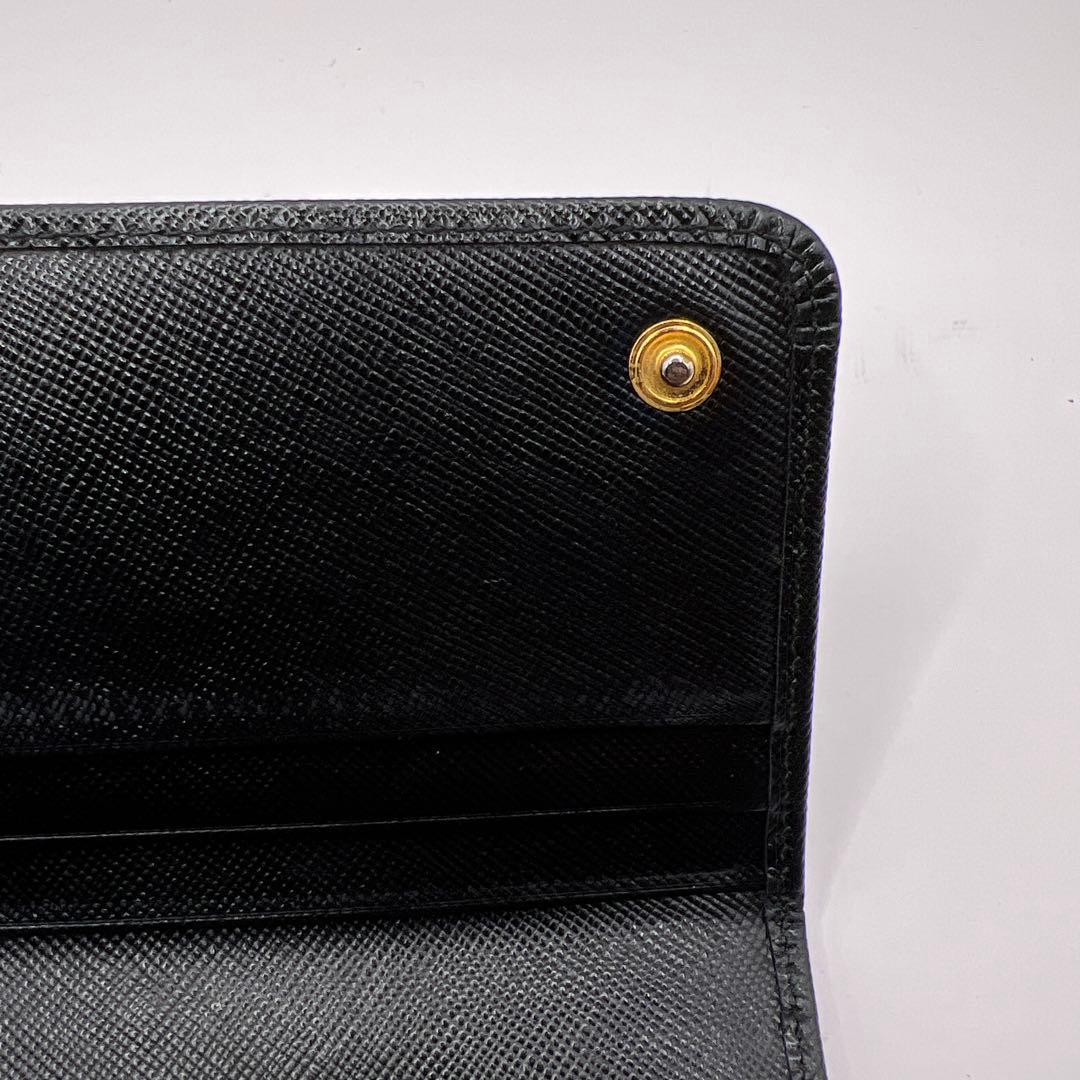 パン子プラダ　リボン　ブラック　長財布　ゴールドロゴ　スナップボタン