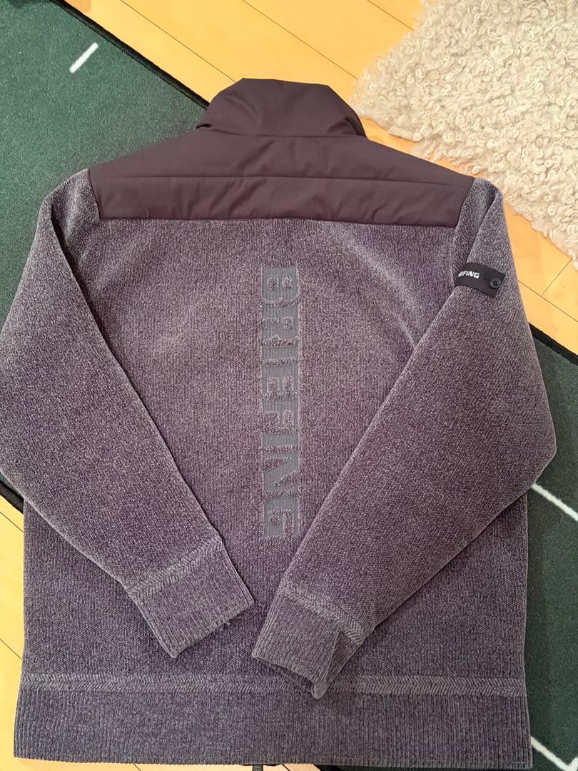 ブリーフィング　アウター　グレーM