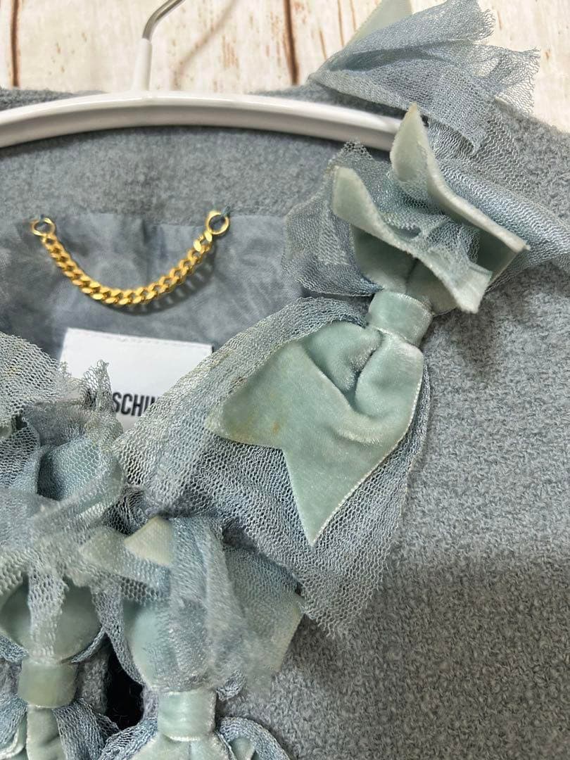 MOSCHINO リボンレースフリルノーカラージャケット ライトブルー