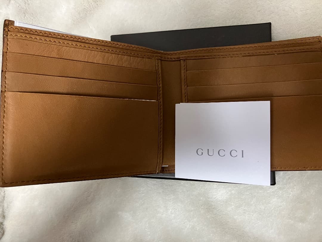 未使用　GUCCI 二つ折り財布 ブラウン レザー