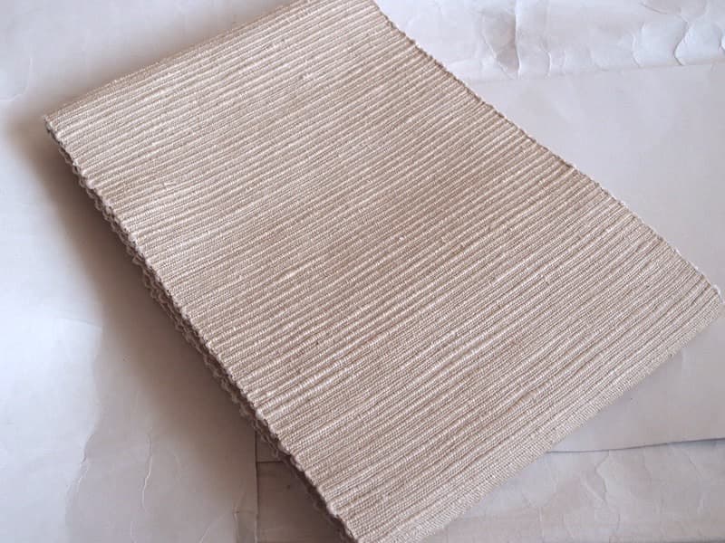 手織りの節紬八寸名古屋帯（オフホワイト無地）正絹美品