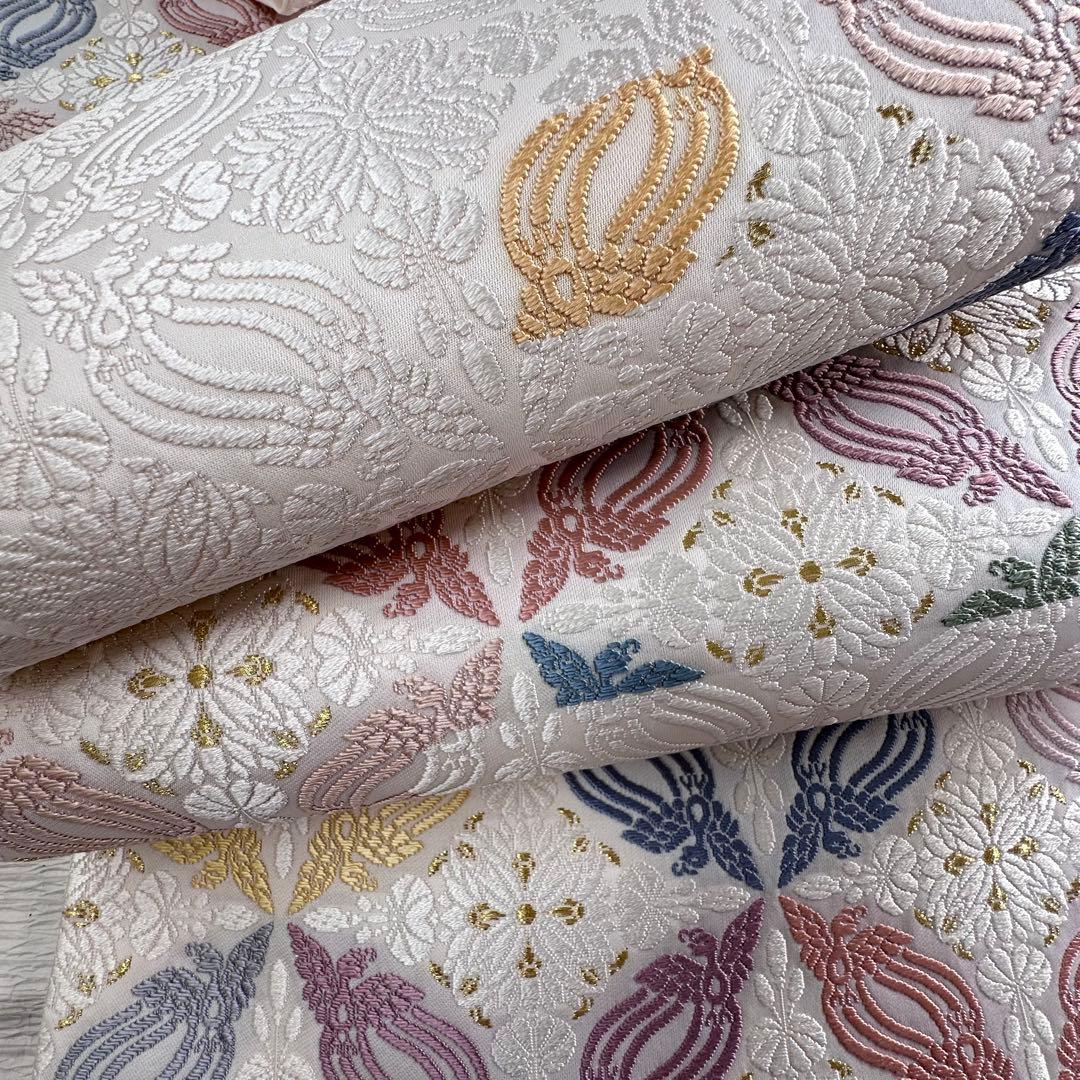 未使用 美しいキモノ掲載柄 華倶楽部 唐織 ひつじ帯 白地七宝繋ぎ正絹六通袋帯