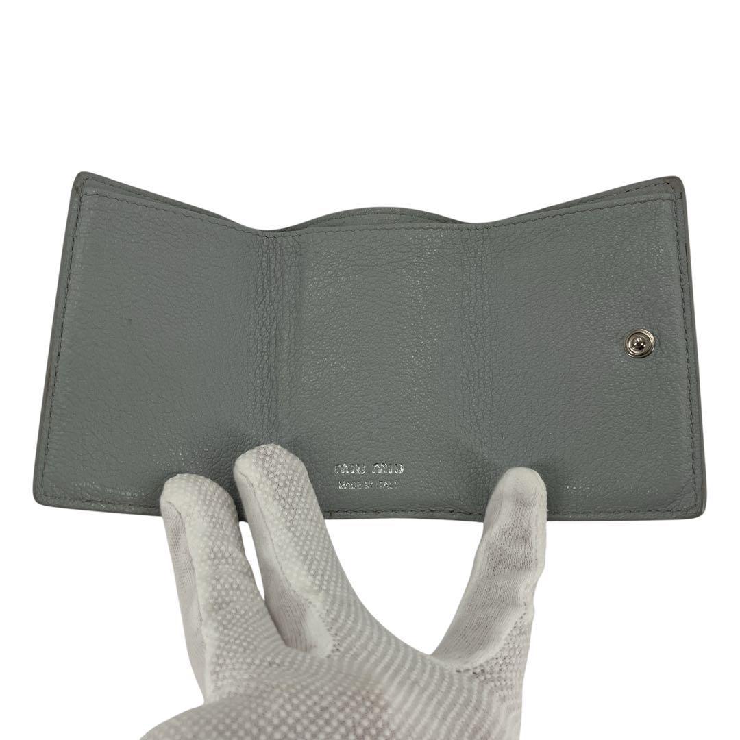 ミュウミュウ　折り財布　コンパクト財布　マドラス　パール　リボン　水色　レザー