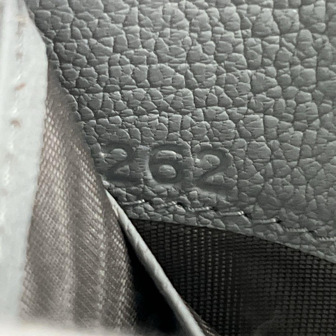 ミュウミュウ　折り財布　コンパクト財布　マドラス　パール　リボン　水色　レザー