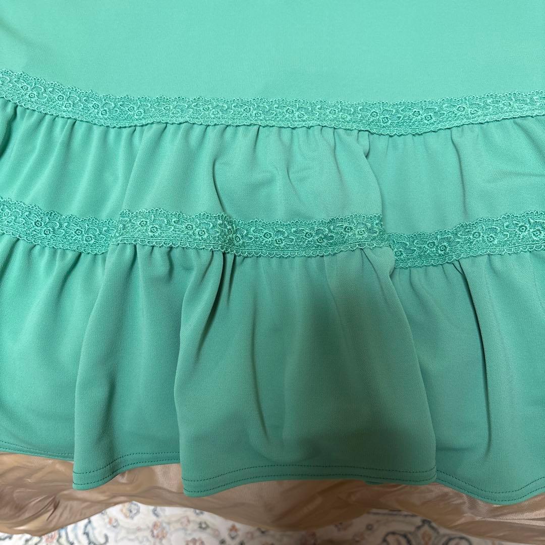 【未使用に近い】✨トクコプルミエヴォル✨グリーン地前中央刺繍裾フリルチュニック❣️