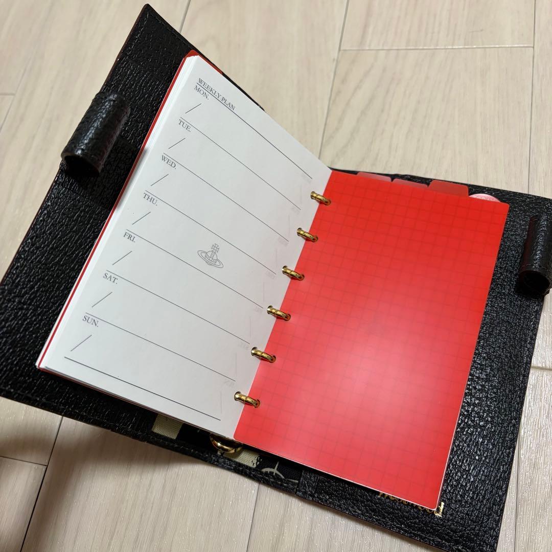 ヴィヴィアンウエストウッド EXECUTIVE オーブ 手帳カバー ブラック 金