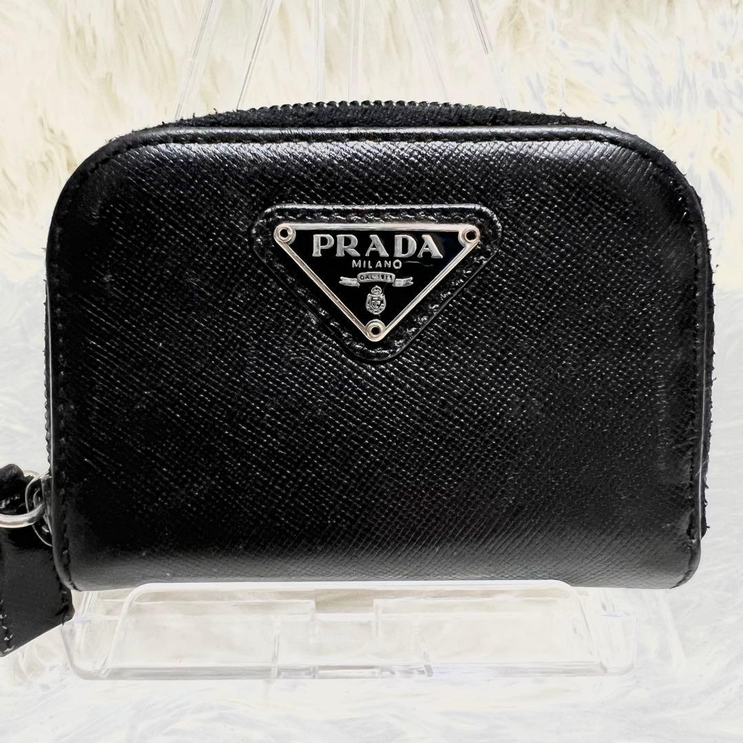 PRADA ケース トライアングルロゴ サフィアーノ 黒 ラウンドジップ