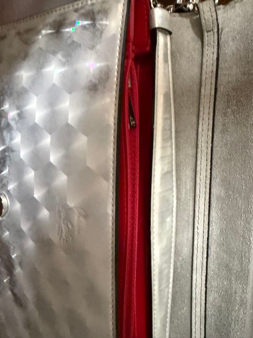 Christian Louboutin スタッズ付きシルバークラッチバッグ