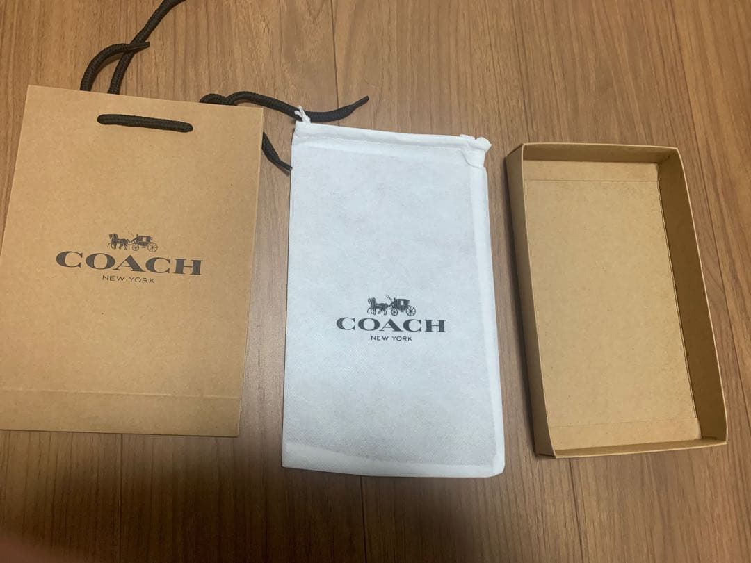 未開封COACH コーチ スヌーピー シグネチャー柄 ラウンドジップ 長財布