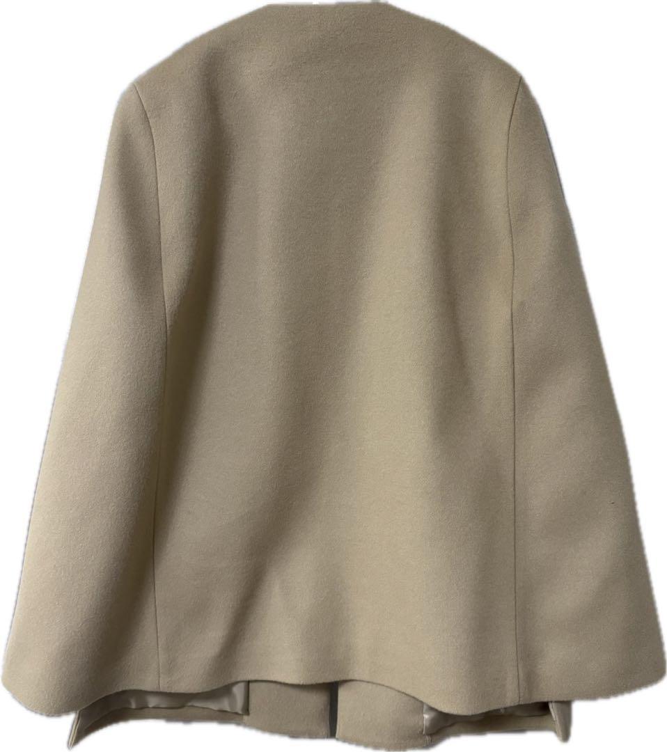 em. エムドット　ポンチョ