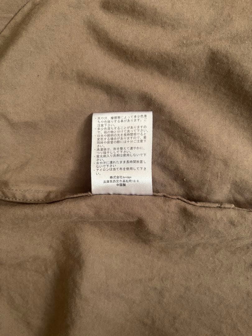 OUR ツイル素材のサファリジャケット